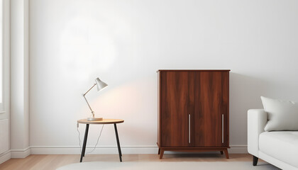 Desk lamp on a small table and a simple, wooden cabinet in an empty living room interior with white wall and place for a sofa. Real photo, realistic. with white shades