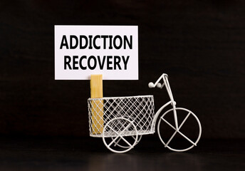 Addiction recovery symbol. Concept words Addiction recovery on beautiful white paper on clothespin....