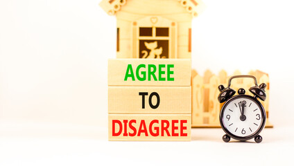 Agree to disagree symbol. Concept words Agree to disagree on beautiful wooden block. Black alarm...