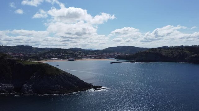 boats sailing in the coast of the basque country