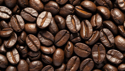Obraz premium A close-up view of rich, roasted coffee beans. The deep brown color and shiny surface highlight their freshness and flavor, perfect for coffee lovers.