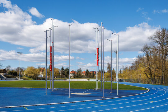 An empty arena for discus and hammer throw training at a city stadium. No safety net. Track and field stadium.