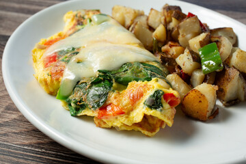 A view of a veggie omelet entree.