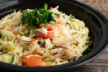 A closeup view of a bowl of Armenian cabbage salad.