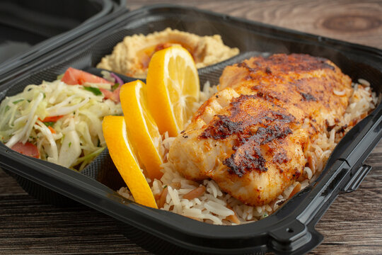 A view of a grilled fish entree.