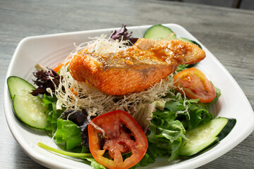 A closeup view of a salmon salad.