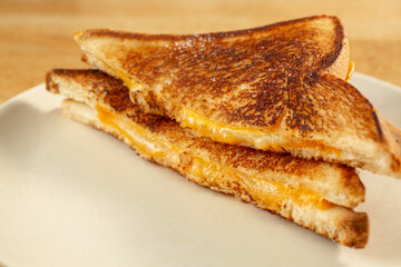 A closeup view of a grilled cheese sandwich.