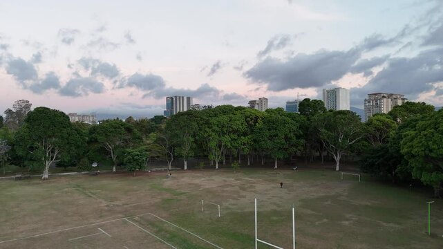 Aerial footage of San Jose Costa Rica La Sabana. Urban Natural Park. 