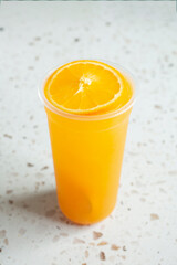A view of an orange fruit tea.