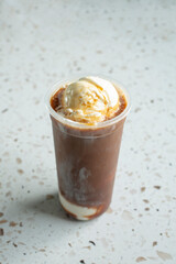A view of a cappuccino float drink.
