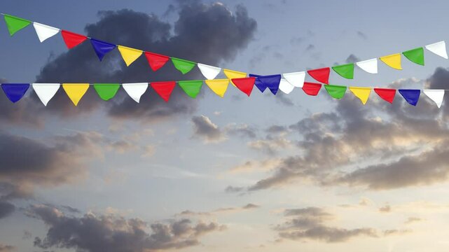 multicolored pennants hanging from a banner that moves slightly in the wind