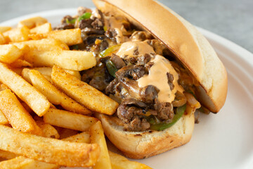 A view of a Mexican style Philly cheesesteak sandwich.
