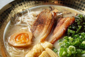 A closeup view of a tonkatsu ramen bowl.