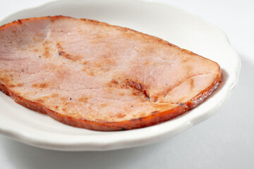 A closeup view of a ham slice.