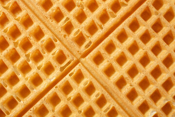 A top down view of a plain waffle, as a background.