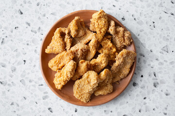A top down view of a gluten-free, dairy-free fried swai.