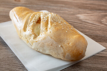 A closeup view of a cream cheese jalapeno roll.