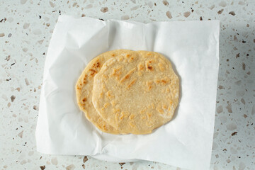 A top down of a stack of pupusas.
