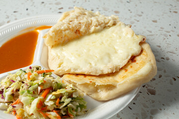 A view of cheese pupusas.