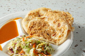 A view of some chicharron pupusas.