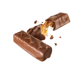 Whole and broken chocolate bars with nuts in the air isolated on white background