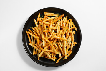A top down view of a plate of cajun fries.