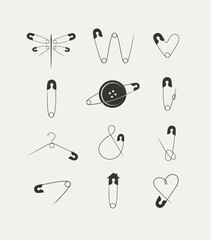 Safety pins collection in minimalist art style drawing on black background