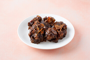A view of a plate of oxtail.