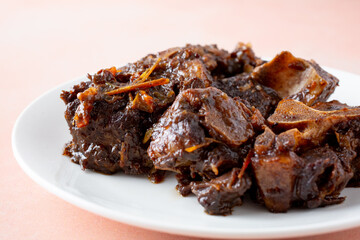 A closeup view of a plate of oxtail.