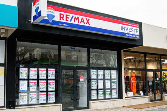 RE MAX real estate office facade in Fatima, Portugal showcasing property listings