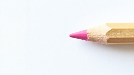 Obraz premium Macro Photograph of Single Pink Colored Pencil with Wooden Shaft on White Background in Sharp Focus