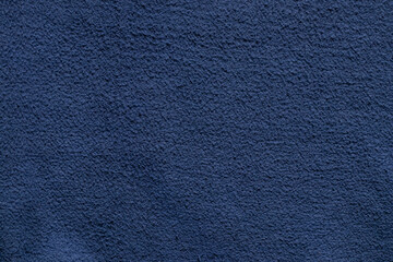 Soft blue fleecy fabric as background , blue sweater