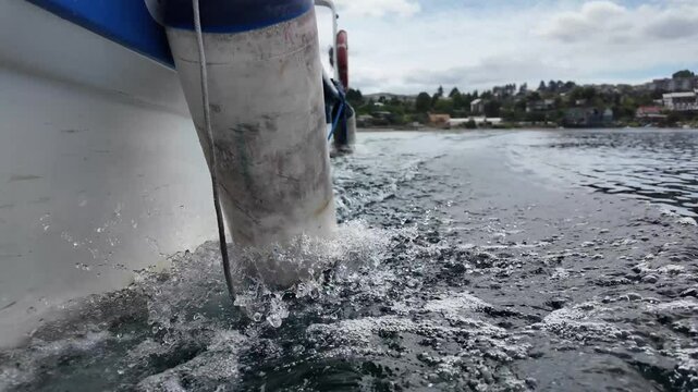 Speedboat Creating Splash on Tranquil River