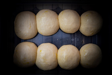 Pizza Dough Balls Resting in a Bowl