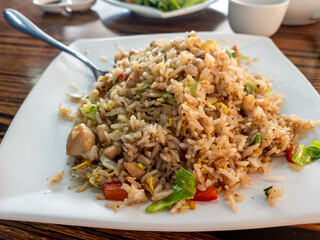 Chicken and vegetables fried rice in shrimp paste dish served in a seaside restaurant in Hong Kong.