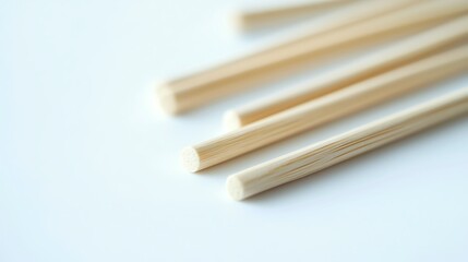 Wooden toothpicks in glass jar on wooden table