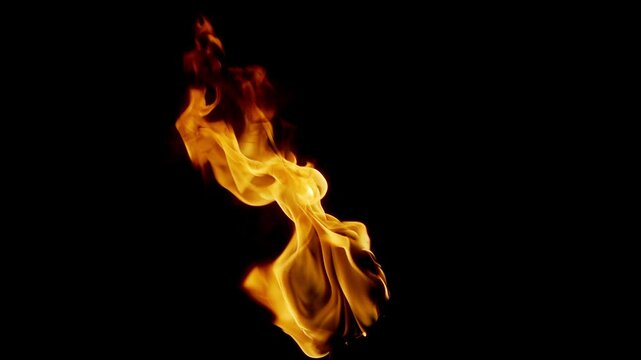 Super slow motion shot of real fire flames, fiery explosion, smoke and sparks isolated on black background. Filmed on high speed cinema camera.