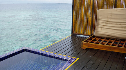 water villa with pool on a exotic maldives island