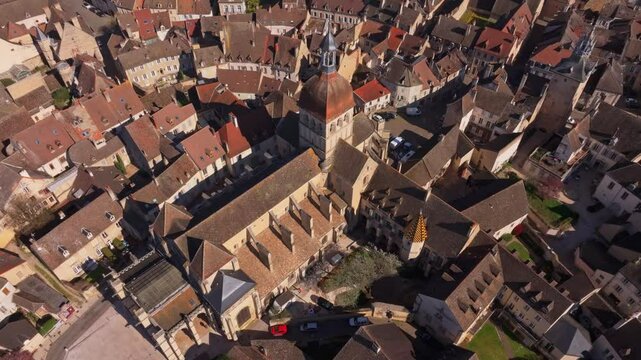 Drone view over Beaune with church at town center. Aerial drone video