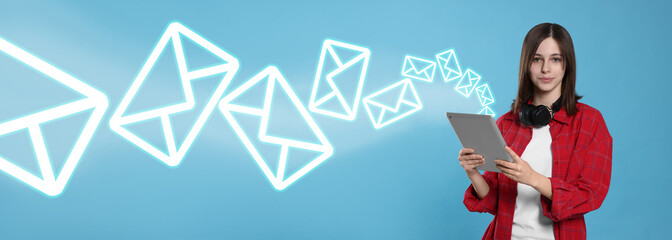 Email message. Teenager using tablet on light blue background, banner design. Envelopes flying out...