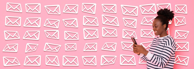 Email message. Happy woman using smartphone on pink background with envelopes, banner design