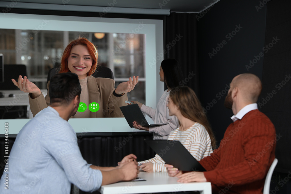 Poster speaker participating in lecture via online video chat. audience and coach in conference room with p