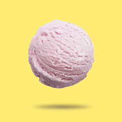 Ice cream scoop in air on yellow background. Yummy dessert