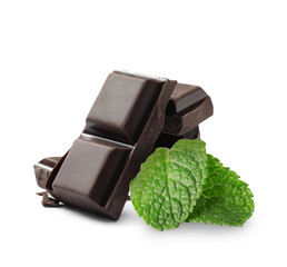 Dark chocolate pieces and mint leaves on white background