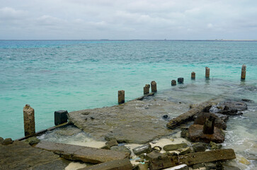 rotten jetty on gulhi island on the maledives