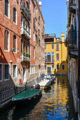Moored boats on the Rio di Sant'Angelo (or Rio de Sant'Anzolo in Venetian), a small canal in the San Marco sestiere, Venice, Veneto, Italy