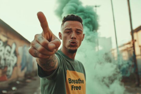 Man expressing freedom with green smoke in urban setting