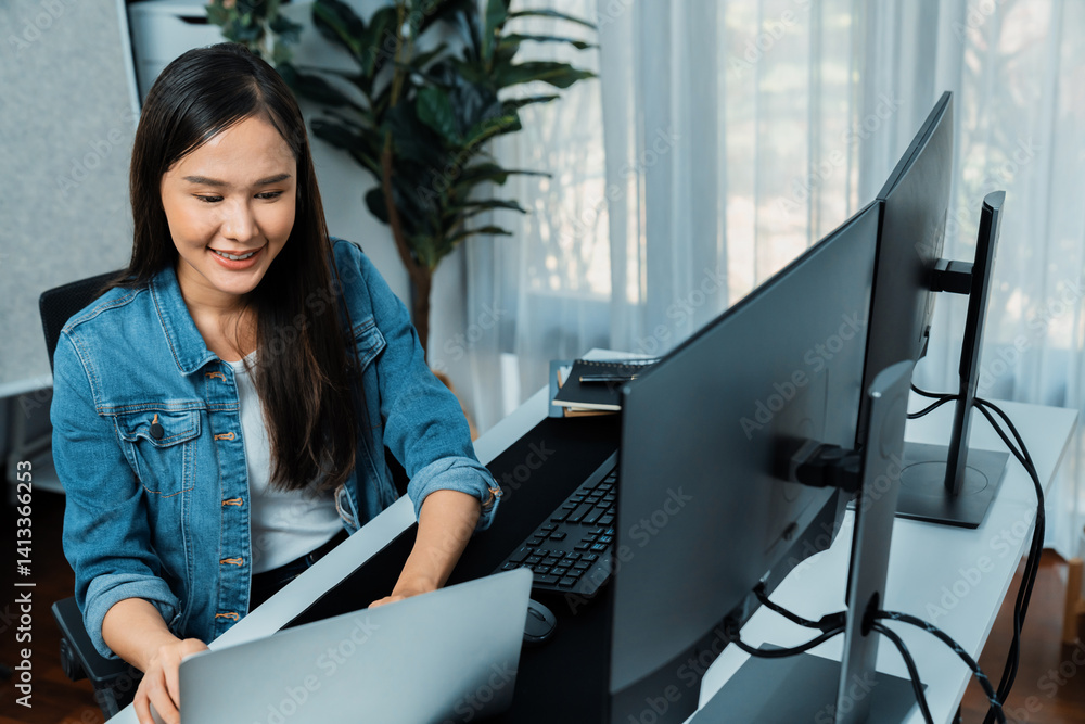 Poster smiling young asian in it developer creating with typing online information on laptop with coding pr