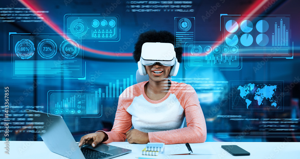 Poster girl using laptop and augmented glasses connecting metaverse while doing homework at table by using 