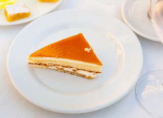 Tender delicious cake topped with orange jelly